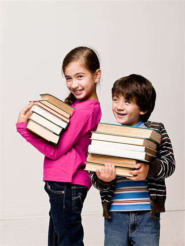 Children holding books